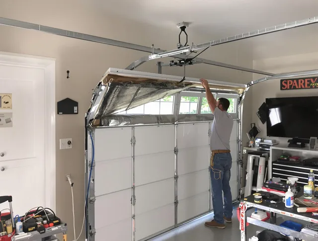 Garage door section replacement by Wilton Garage Door Repair in Wilton