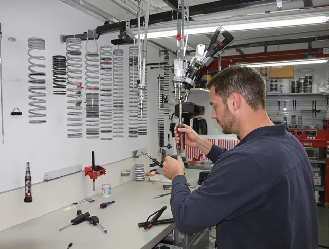Wilton Garage Door Repair safety certified technician performing precision spring replacement in Wilton