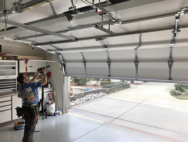 Garage door track repair service by Wilton Garage Door Repair in Wilton